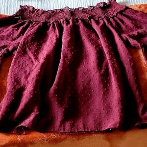 Wine off the shoulder shirt.